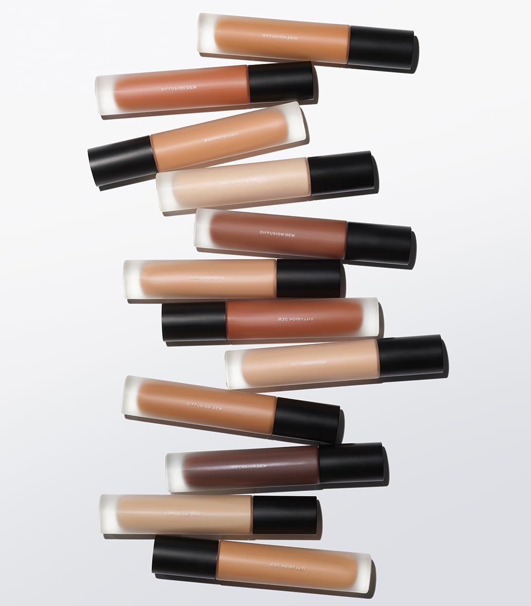 MAKE Beauty Diffusion Dew Skin Tint. Sheer to Medium Coverage Radiant Finish. Blurring, Smoothing, and Brightening for Glowing Complexion. Enhanced with Niacinamide and Adenosine. Tan 06 MAKE Au supplements